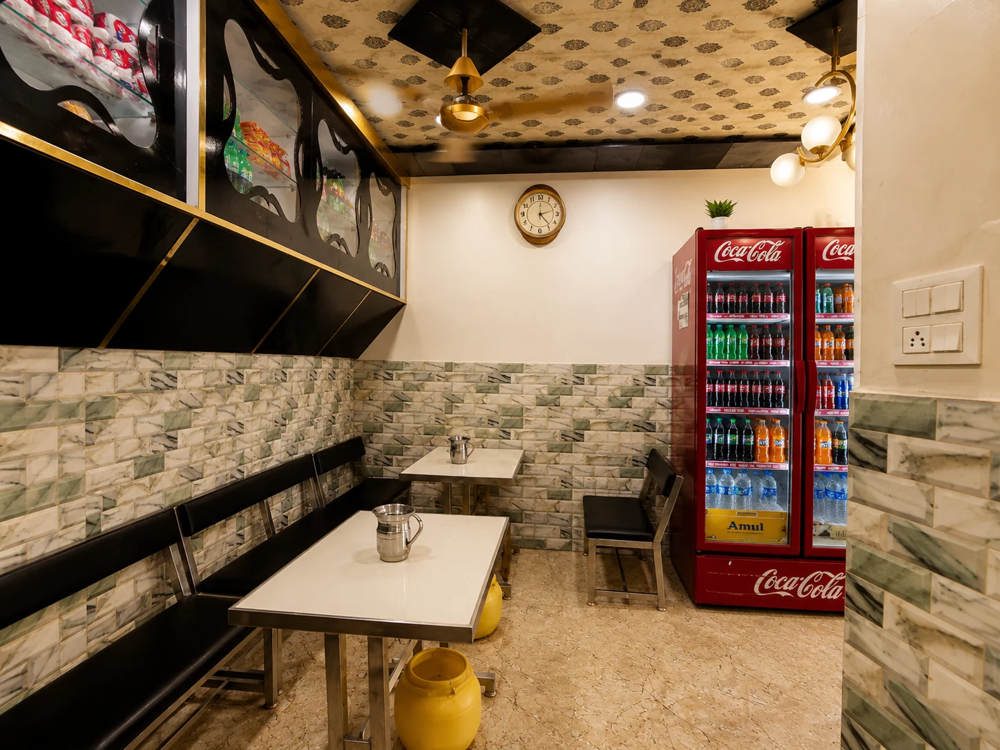 Anil Mishthan Bhandar shop interior — traditional atmosphere with warm lighting and mithai display